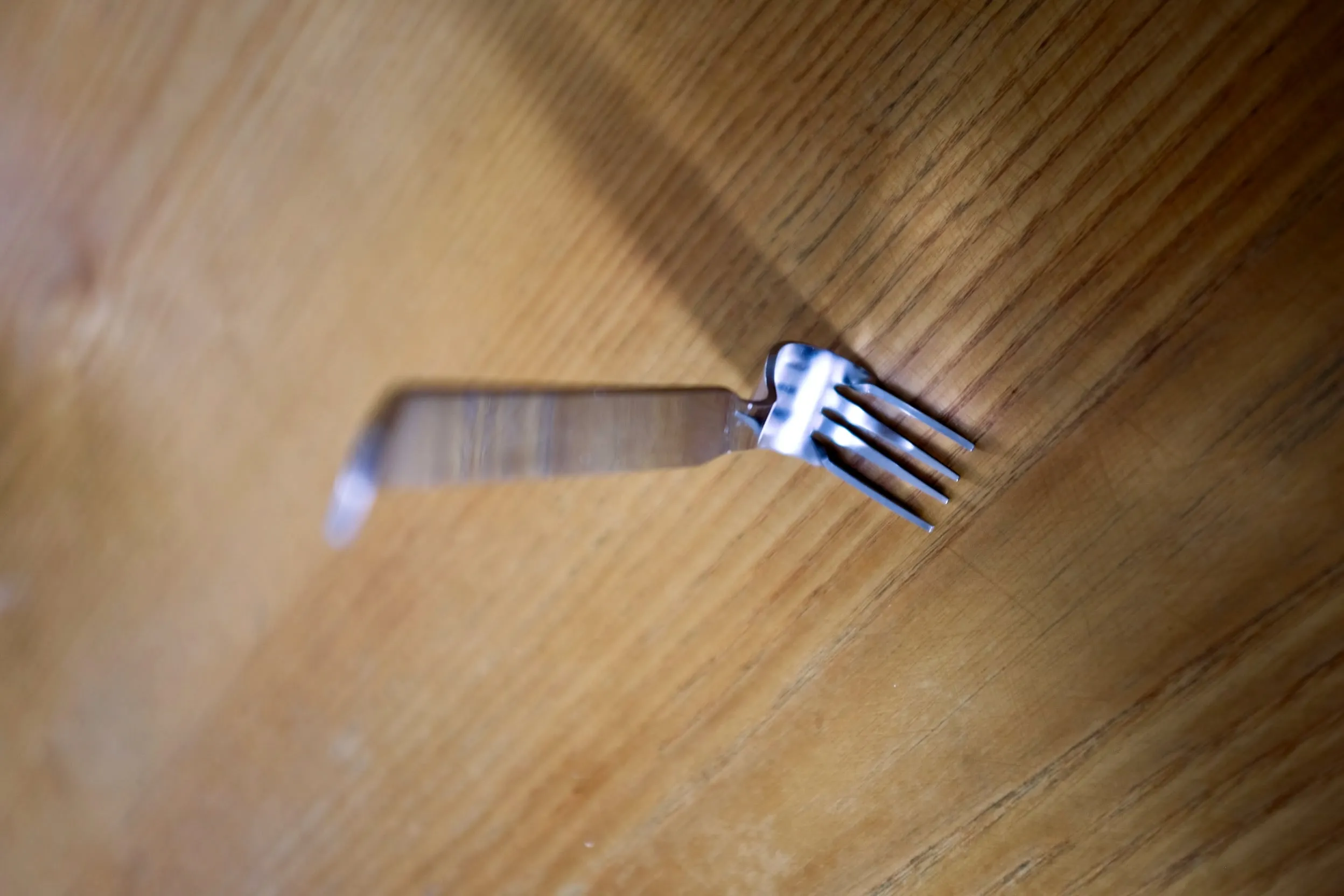 A bent fork made for mashing food